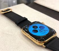 Image result for Gold Apple Watch with Black Leather Band