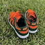 Image result for Orange and Green Nike Shoes
