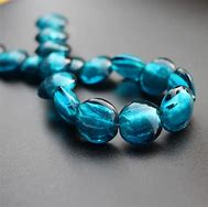 Image result for Flat Teal Beads