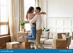 Image result for Image of a New Homeowner Couple Celebrating Their Purchase
