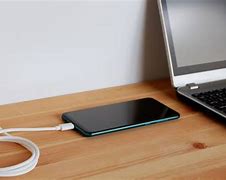 Image result for Phone and Charger Pic. Tue