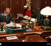 Image result for President Putin at Desk