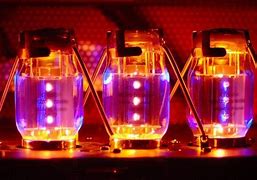 Image result for Radio Console with Glowing Green Vacuum Tube
