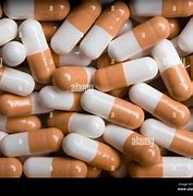 Image result for Orange and White Capsule Pill