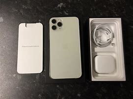 Image result for White iPhone 11 On Table in Box