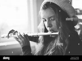Image result for Singer Who Plays Flute