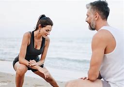 Image result for Couple Wresting Beach