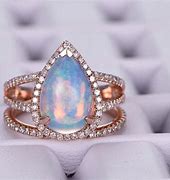Image result for Rose Gold Opal Wedding Ring