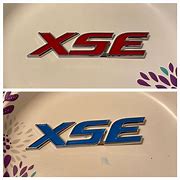 Image result for XSE Logo Red Car