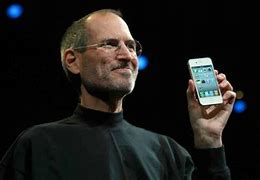Image result for Steve Jobs Looking at iPhone