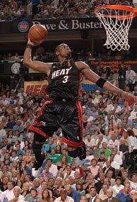 Image result for Dwyane Wade Dunking Miami Heat