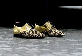 Image result for Golden Shoes Phone