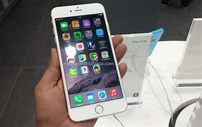 Image result for iPhone 6 Plus Size in Hand