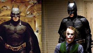Image result for Batman Begins Suit vs Dark Knight