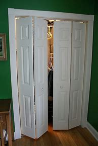 Image result for White Bifold Closet Doors