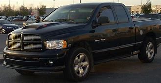 Image result for Lifted 4th Generation Ram 1500 Black