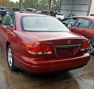 Image result for Mazda Millenia Red