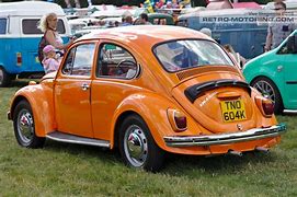 Image result for Orange Volkswagen Beetle