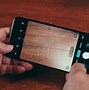 Image result for Moto G73 in Hand