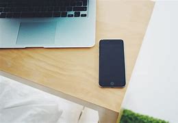 Image result for iPhone 5 C On a Desk