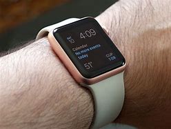 Image result for Rose Gold Apple Watch with Black Sports Band