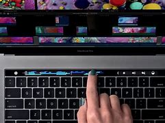 Image result for MacBook Pro with Touch Bar Run Over with Car