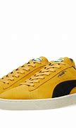 Image result for Puma Suede Black and Yellow