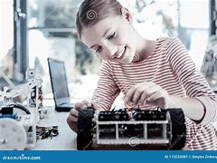 Image result for Girl Building Robotic Car