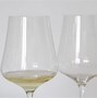 Image result for One Tipped Champagne Glass