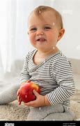 Image result for Baby's Arm Holding an Apple
