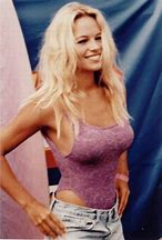 Image result for 90s Christmas Pamela Anderson