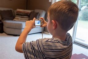 Image result for Child Operating a Video Camera