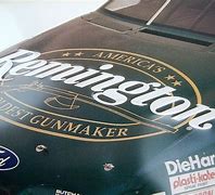 Image result for Remington 75 Race Car Tin Sign