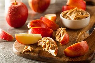 Image result for Peanut Butter and Rainsns in Apple Core