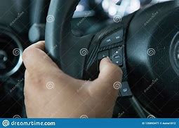 Image result for Flexed Arm Holding Steering Wheel