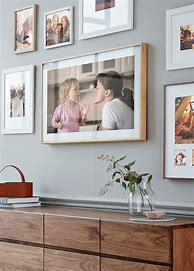 Image result for Picture Frames On Wall around TV