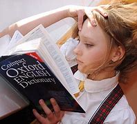 Image result for Person Reading Oxford Dictionary