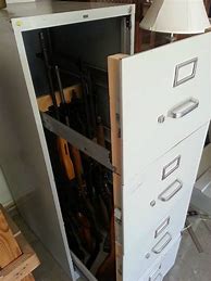 Image result for DIY Hidden Gun Cabinet