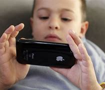 Image result for Kid with iPhone 13