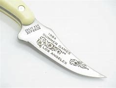 Image result for Sharpfinger Knife Scrimshaw