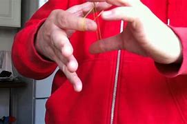 Image result for Rubber Band Magic Tricks
