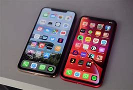 Image result for iPhone XS Max in Hand vs Xr