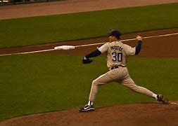 Image result for Joe Girardi Greg Maddux