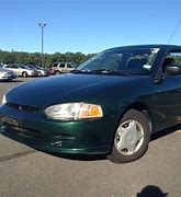 Image result for 1999 Mitsubishi Mirage Coupe