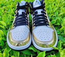Image result for Gold and White Air Jordans