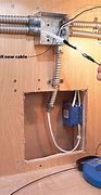 Image result for Channeling Cables into Wall