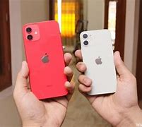 Image result for iPhone 11 vs 12 Mini in Hand