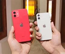 Image result for iPhone 12 Mini Size Compare to Hand