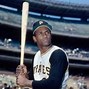 Image result for Roberto Clemente Holding Two Bats