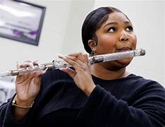 Image result for Lizzo Plays Crystal Flute
